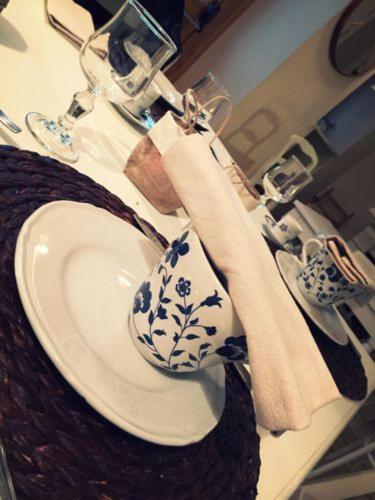 a bathroom sink with a blue and white towel at Masseria Fontana dei Fieri in Pietrelcina