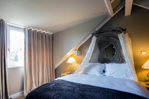 เตียงในห้องที่ Le B Cottage & SPA Privé