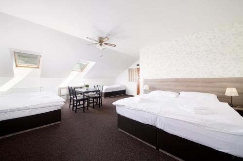 Krevet ili kreveti u jedinici u okviru objekta Ski Hotel Svoboda nad Úpou