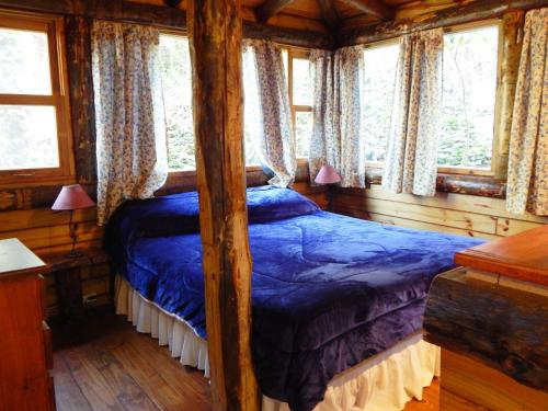 מיטה או מיטות בחדר ב-Las Terrazas Resort & Apart-Cabañas