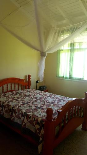 Flane Gite Rural De Tourisme tesisinde bir odada yatak veya yataklar