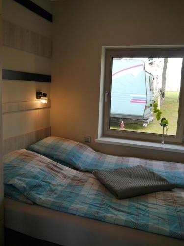 Katil atau katil-katil dalam bilik di Baltic Holiday Houses