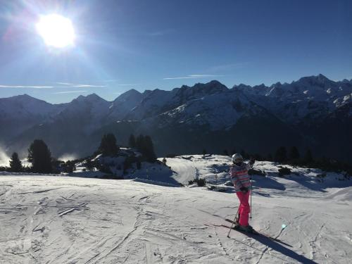 a person on skis in the snow on a mountain at Ferienwohnungen Flörl in Zell am Ziller