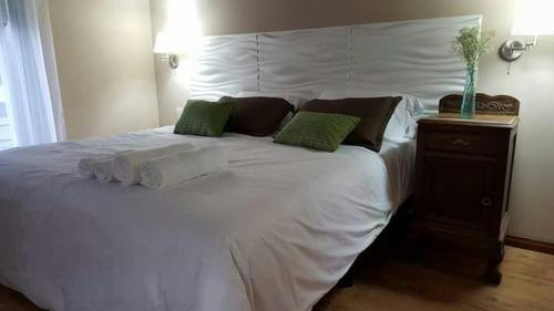 Ένα ή περισσότερα κρεβάτια σε δωμάτιο στο Hotel Las Calas