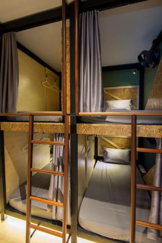 Postel nebo postele na pokoji v ubytování Finess Basic Hotel