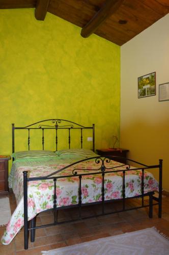Katil atau katil-katil dalam bilik di Agriturismo E Turre