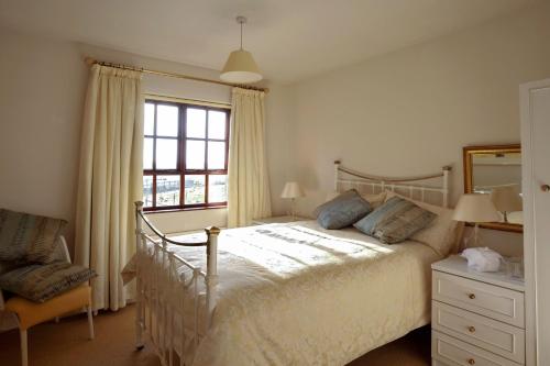 Postel nebo postele na pokoji v ubytování Pinewood Lodge Guest House
