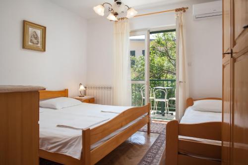 Postel nebo postele na pokoji v ubytování Sobe Zlata