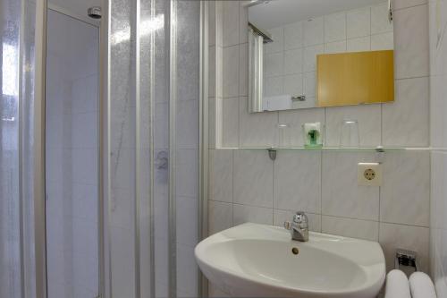 Koupelna v ubytování Central Hotel Friedrichshafen