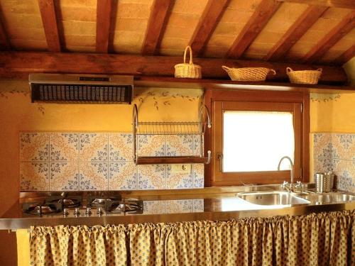 Kjøkken eller kjøkkenkrok på Agriturismo Fiore di Campo