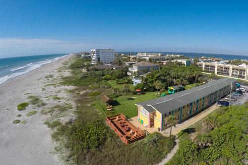 an overhead view of a beach and a building at South Beach Inn - Cocoa Beach in Cocoa Beach