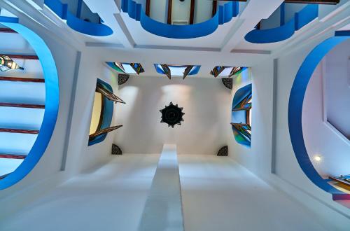 Ein Bett oder Betten in einem Zimmer der Unterkunft Dar Yakout