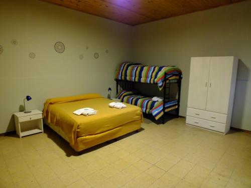 Ένα ή περισσότερα κρεβάτια σε δωμάτιο στο Hostal Amalaya