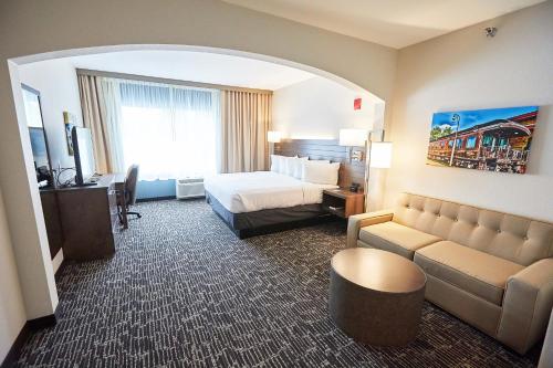 Voodi või voodid majutusasutuse Gundersen Hotel & Suites toas