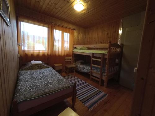 Ένα ή περισσότερα κρεβάτια σε δωμάτιο στο Hostel Laguun