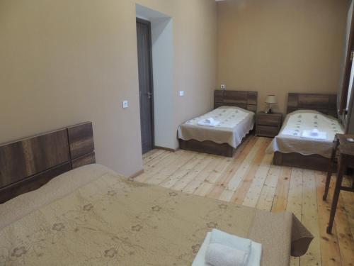 Postel nebo postele na pokoji v ubytování Guest House Chirina