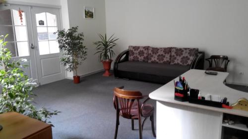 a living room with a couch and a table at Hotel Avatar in Oleksandriya