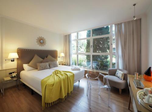 Postel nebo postele na pokoji v ubytování Vilana Hotel Boutique