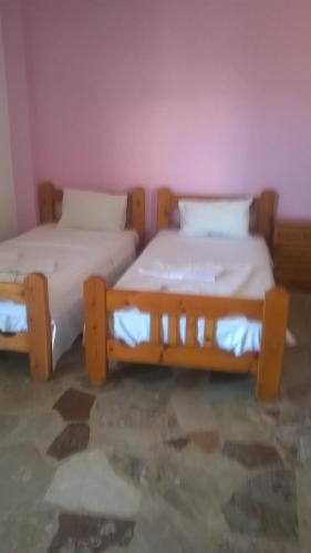 Ένα ή περισσότερα κρεβάτια σε δωμάτιο στο Maria Apartments