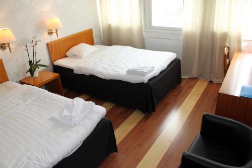 Katil atau katil-katil dalam bilik di Hotel Alexander