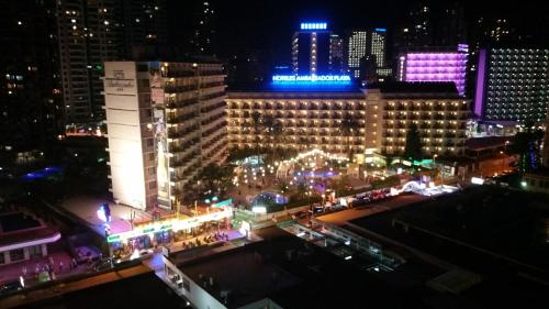 a view of a city at night with lights at Hany apartment Ducado 11-C in Benidorm