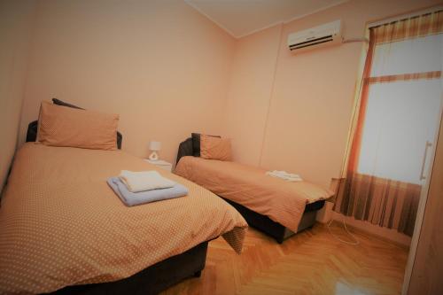 Una cama o camas en una habitación de Hostel Fine