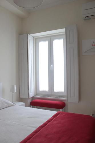 Ένα ή περισσότερα κρεβάτια σε δωμάτιο στο Huga Home