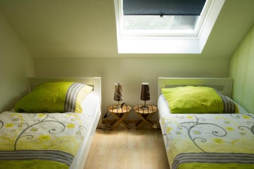 Komfortable Apartments in der Villa Euleにあるベッド