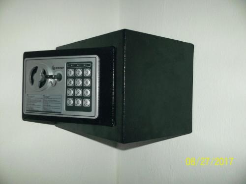 a black box with a remote control in it at La Casa del Chac in Mérida