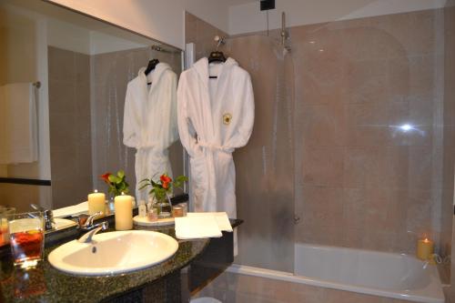 Ванная комната в Hotel Due Leoni