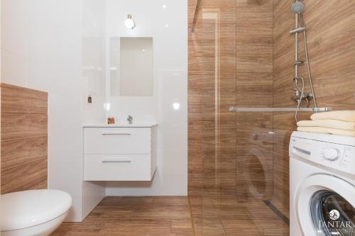Ett badrum på Jantar Apartamenty - Pod Lipami