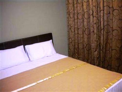 Cama o camas de una habitación en BBP Hotel