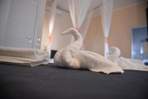 Postel nebo postele na pokoji v ubytování La Gioia di Sicilia B&B