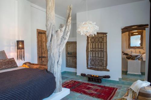 Letto o letti in una camera di Munga Guesthouse