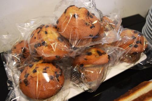 a bunch of cookies in plastic bags on a table at Hotel New Bilbao Airport in Derio