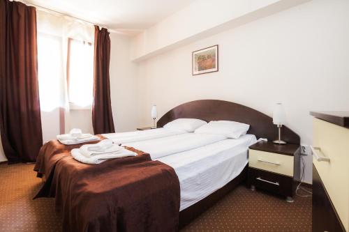 Hotel Domogledにあるベッド