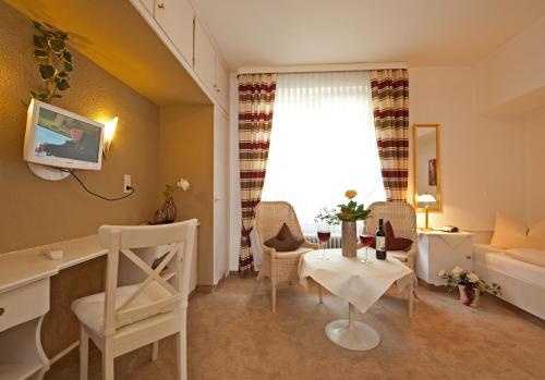 Χώρος καθιστικού στο Boutiquehotel Das Haus am Walde