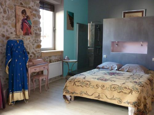 Кровать или кровати в номере La Mirandole