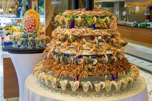 a display of food on a display rack in a store at Royal Holiday Palace in Lara
