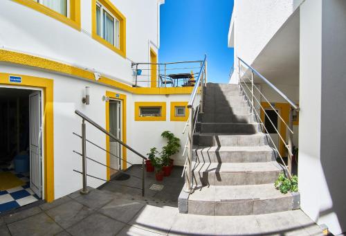 a stairway leading up to a building at Alojamento Bela Vista in Lajes do Pico
