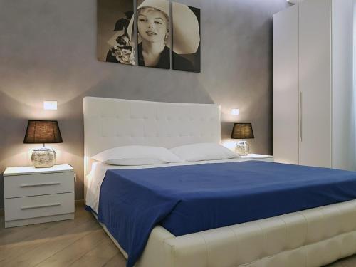 Ένα ή περισσότερα κρεβάτια σε δωμάτιο στο Domus Barberini