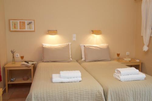 Postel nebo postele na pokoji v ubytování Myrtia Apartments