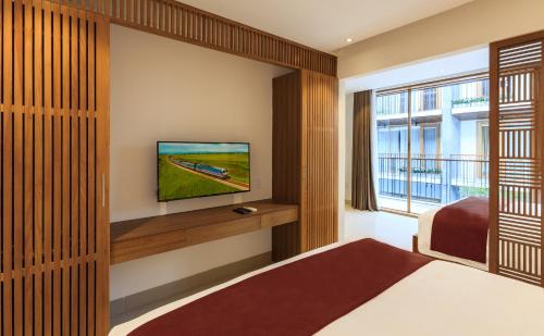 Μια τηλεόραση ή/και κέντρο ψυχαγωγίας στο Tam House Villa Hotel