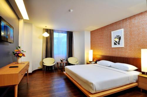 Postel nebo postele na pokoji v ubytování Flipper Lodge Hotel - SHA Extra Plus