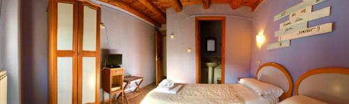 Llit o llits en una habitació de Casa Rural Araceli