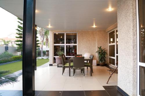Foto da galeria de Cycad Palm Guest House Gaborone em Gaborone