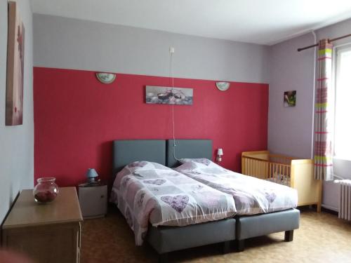 Postel nebo postele na pokoji v ubytování Gîte ferme du moulin
