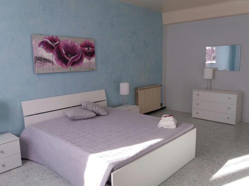 Postel nebo postele na pokoji v ubytování Il Gelsomino