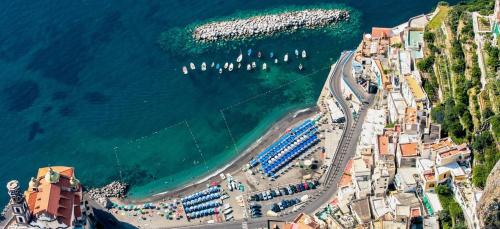 an aerial view of a beach and the ocean at MeFra Camere - Amalfi Coast in Atrani