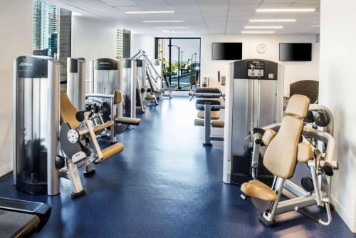 a gym with rows of treadmills and machines at Hyatt Regency Chicago in Chicago